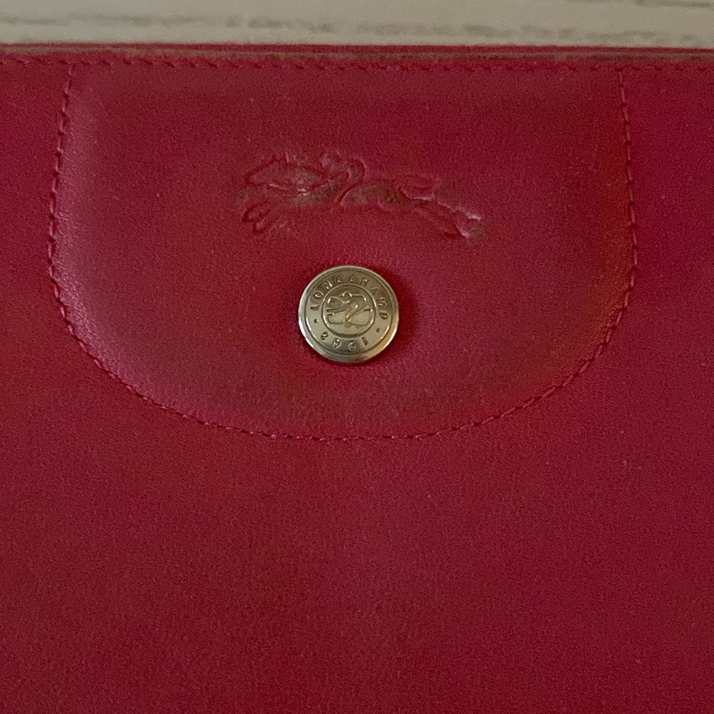 Longchamp Euro wallet. Fabulous red! Some wear on corners-shown in photos.